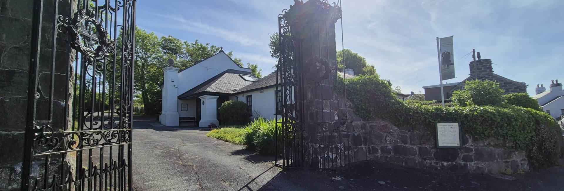 The Museum gates, which are open